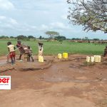 4000 People smile as Oyam South MP aspirant Patrick Ogwang Obura repairs a borehole